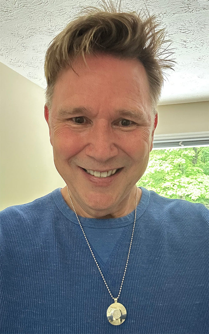 Michael Budnick - Holistic Financial Planner ["..When I started wearing my Q-Link Pendant, I could feel an immediate difference in my energy field. I felt more calm and relaxed...."]