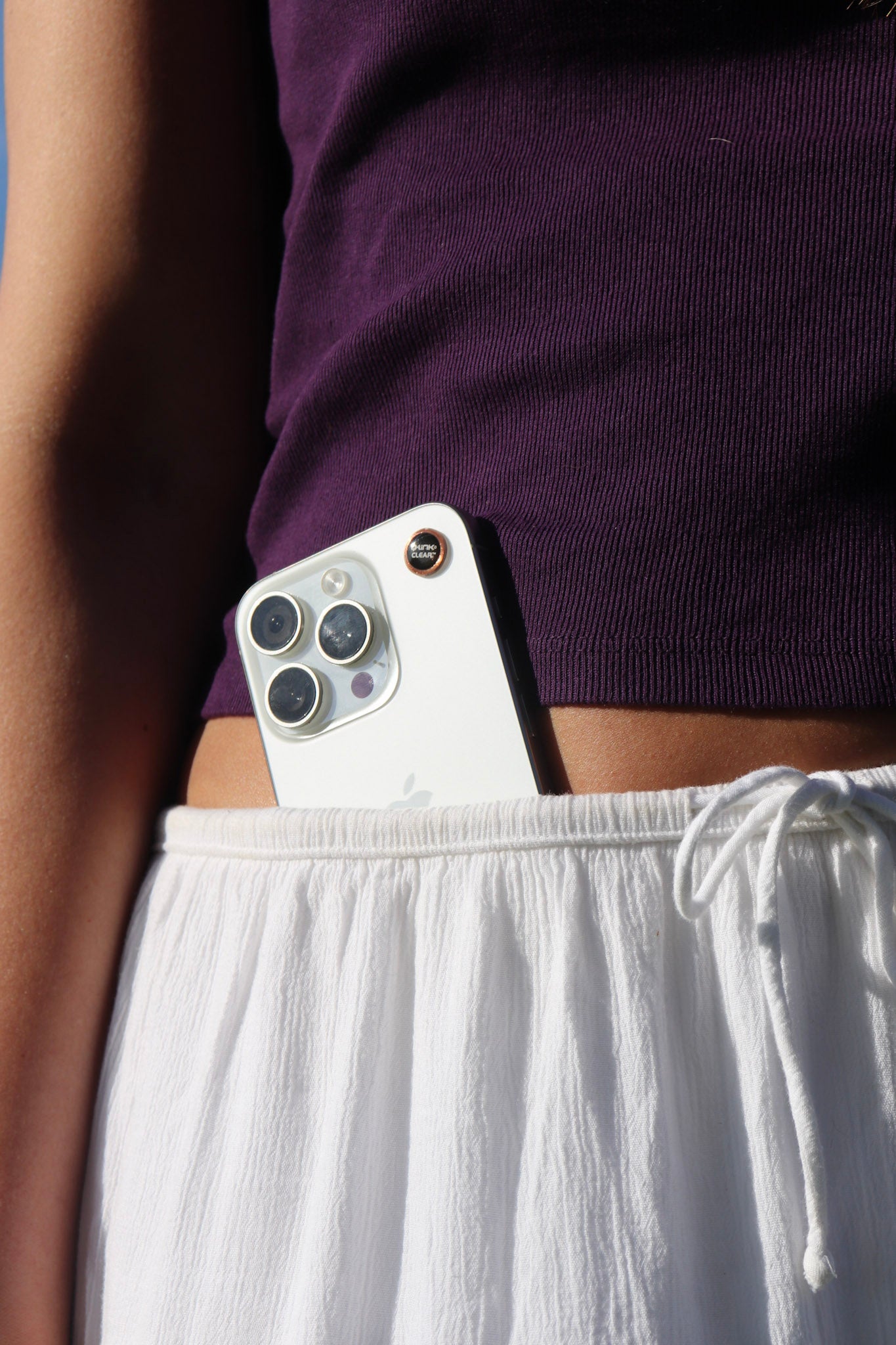 Q-Link CLEAR on a phone showing device-based wellness technology
