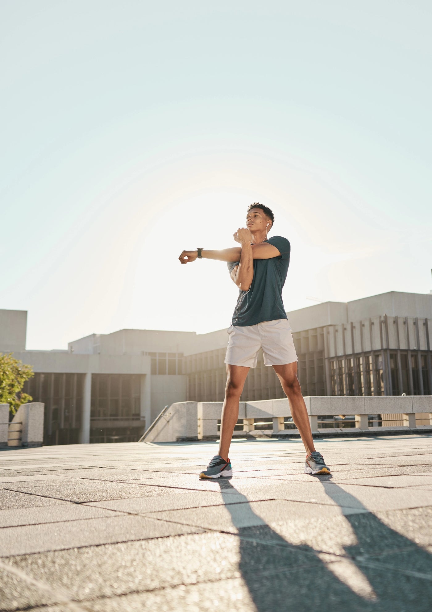 Person exercising outdoors for Q-Link strength and physical response research card